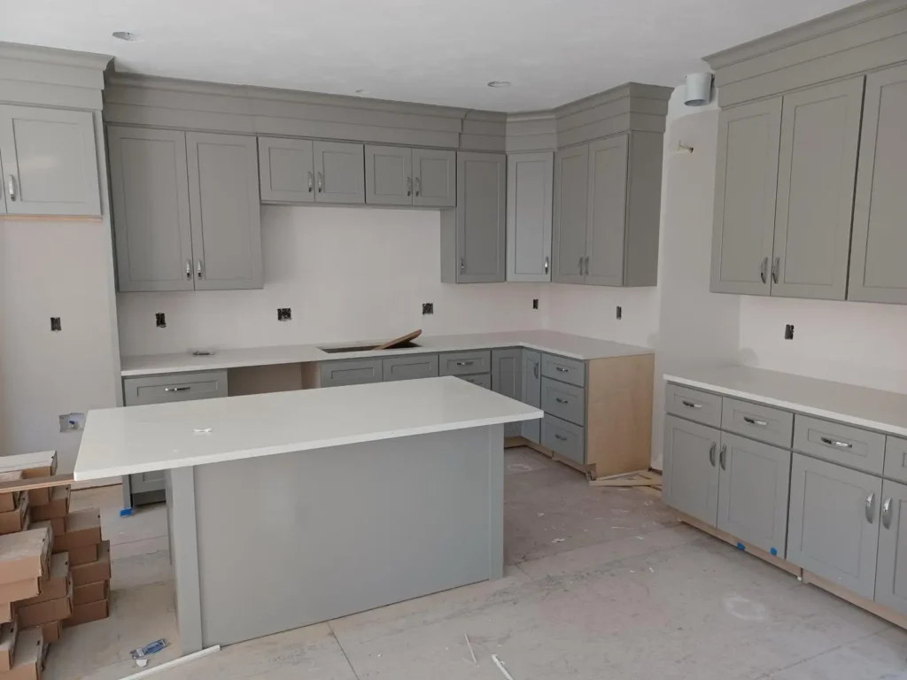 Kitchen cabinets and island installed